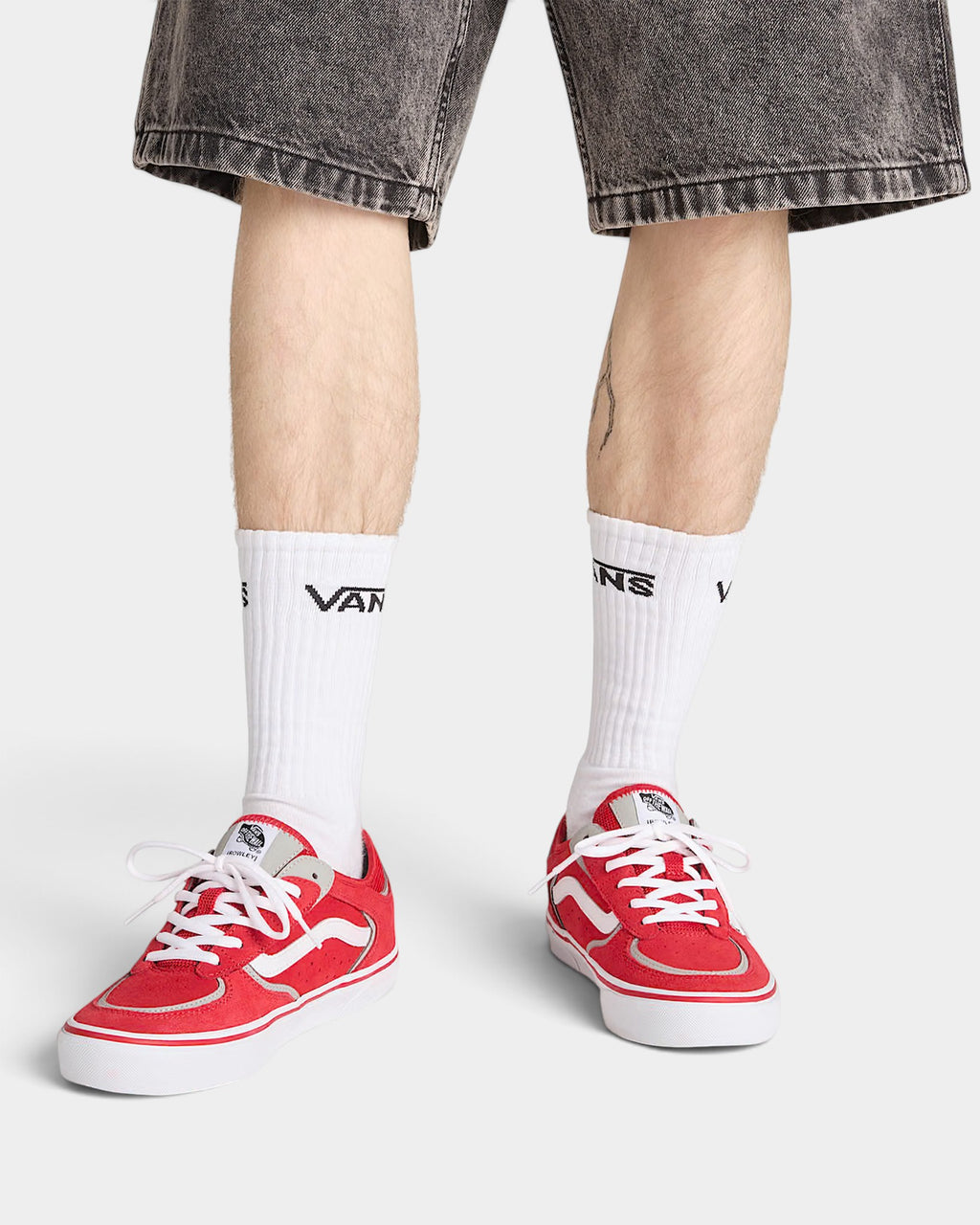 Lockwood Avenue Vans Skate Rowley red and gray leather mesh skate shoes with white laces worn on feet