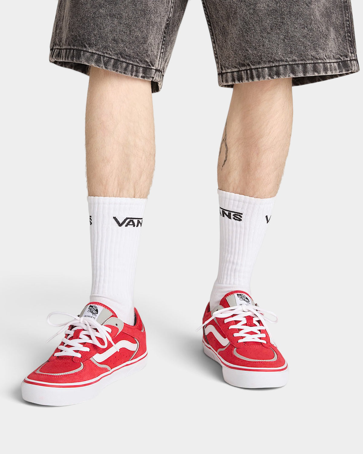 Lockwood Avenue Vans Skate Rowley red and gray leather mesh skate shoes with white laces worn on feet