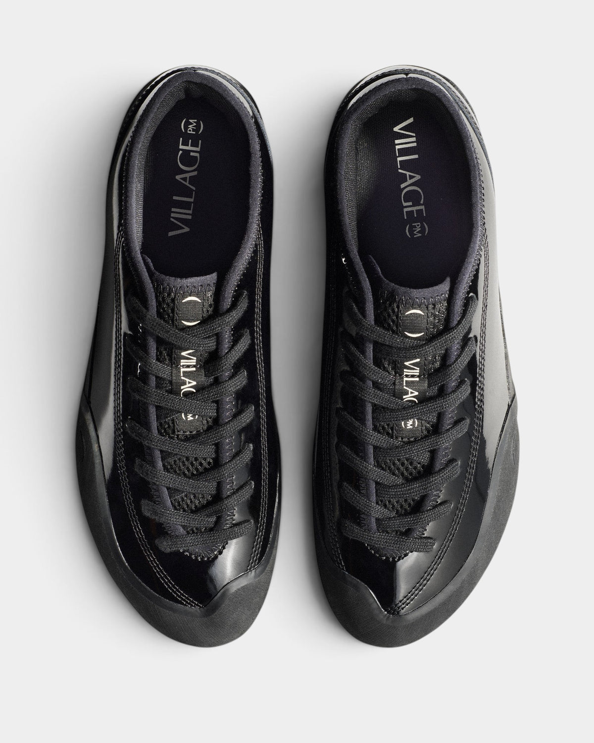Lockwood Avenue Village PM 1.30PM skate shoes in gloss black synthetic leather with offset lacing and rubber soles.