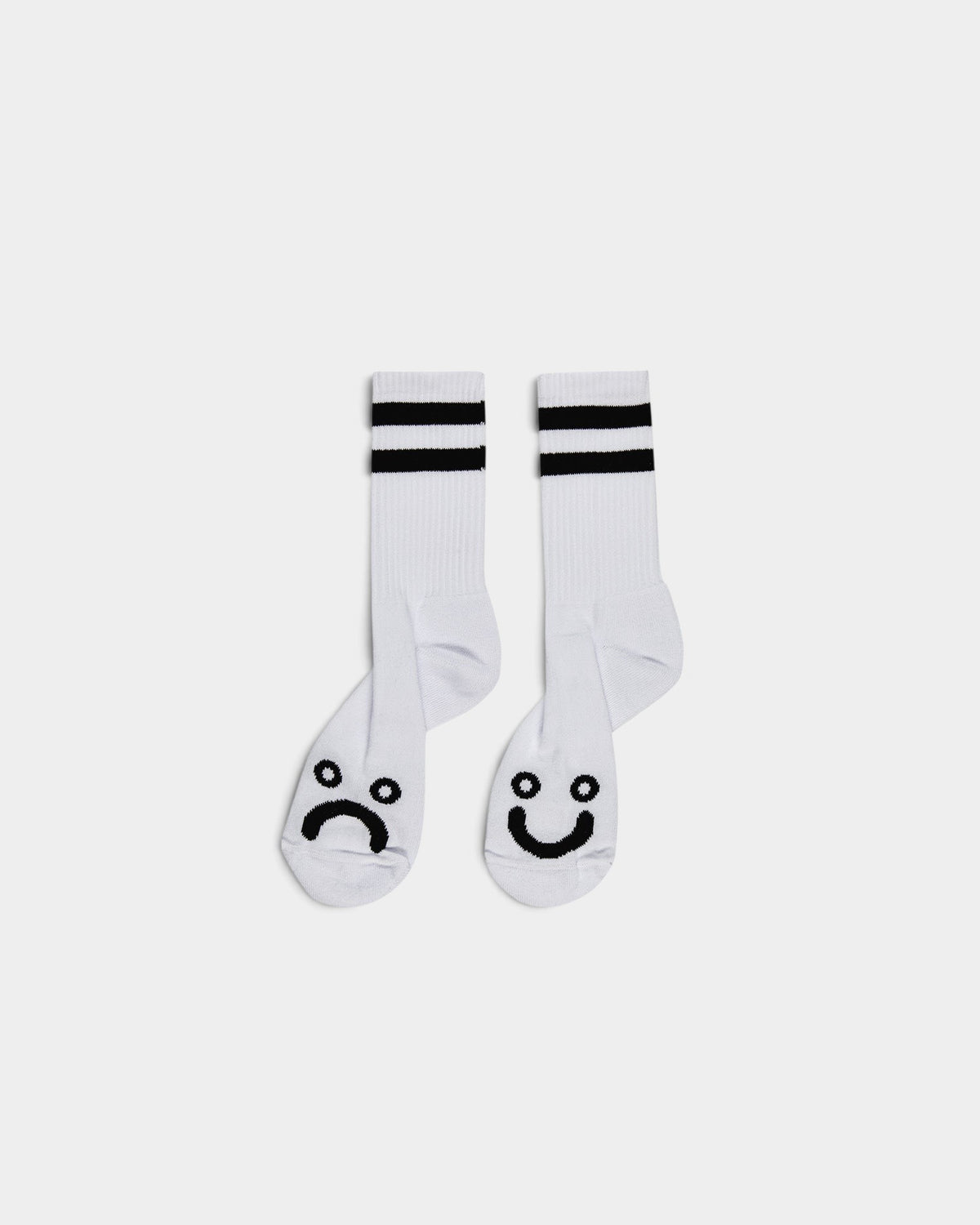 Lockwood Avenue white ribbed crew socks featuring black happy and sad face embroidery at the toes and calf stripes.
