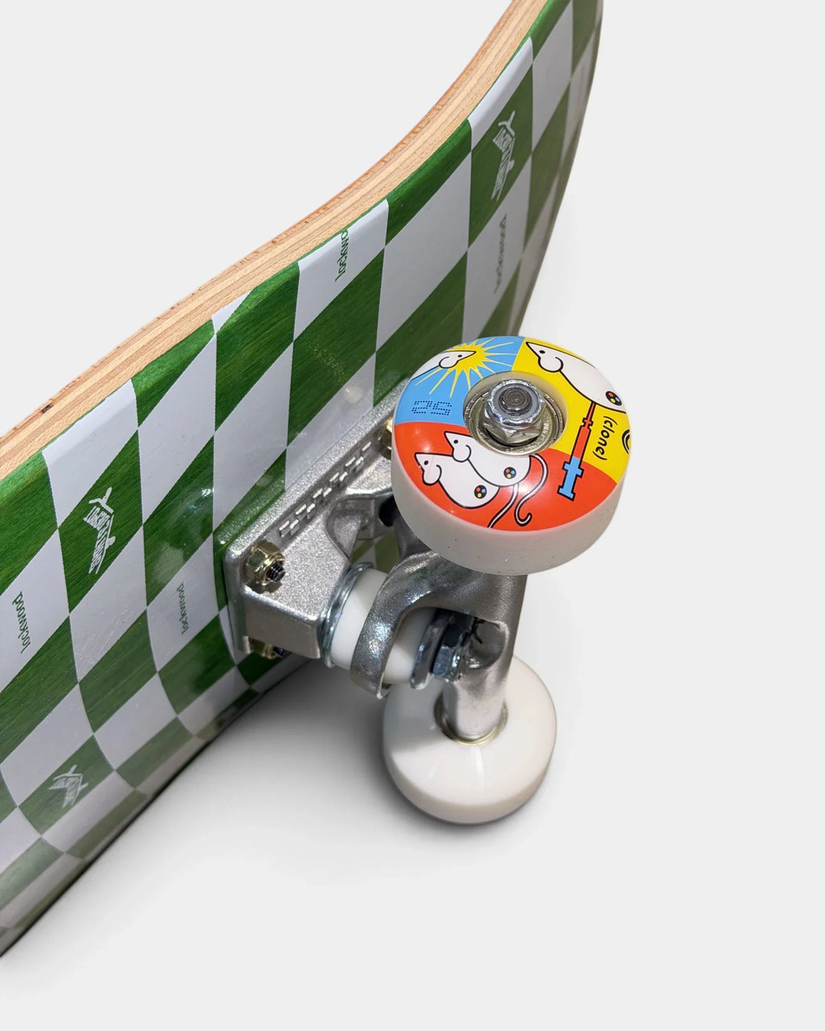 Close-up of an Alien Workshop Clone 52mm wheel with a colorful mice graphic on a silver Ace truck under the green and white checkered Lockwood deck.