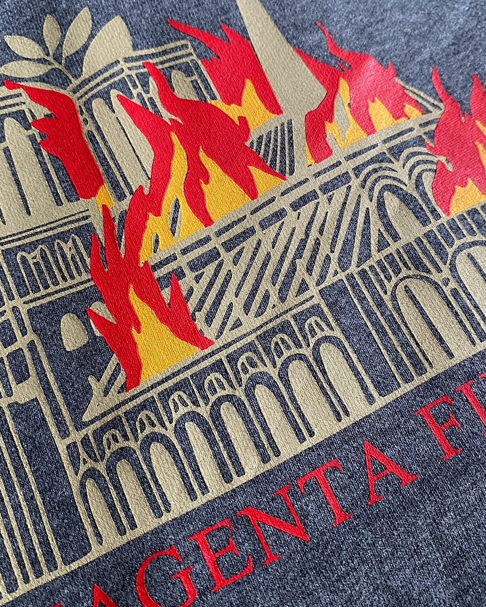 Magenta Fire Dept Hoodie - Dark Heather, close-up of the burning Notre-Dame print and Magenta Fire Dept lettering