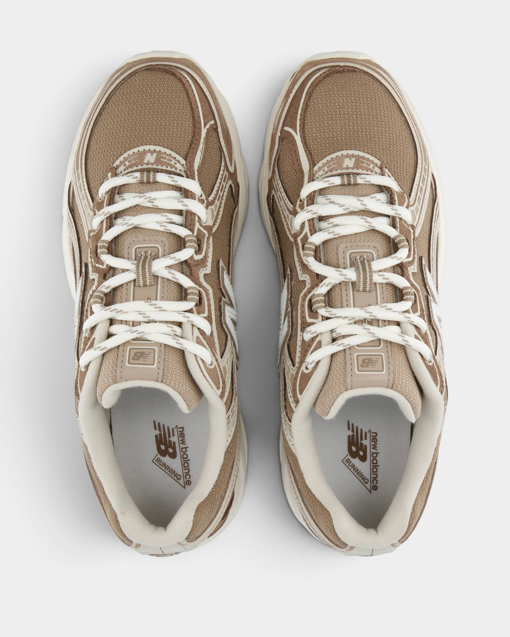 New Balance 740v2 Shoes in Mushroom/Driftwood, pair from above with off-white laces over a taupe mesh upper and beige collars