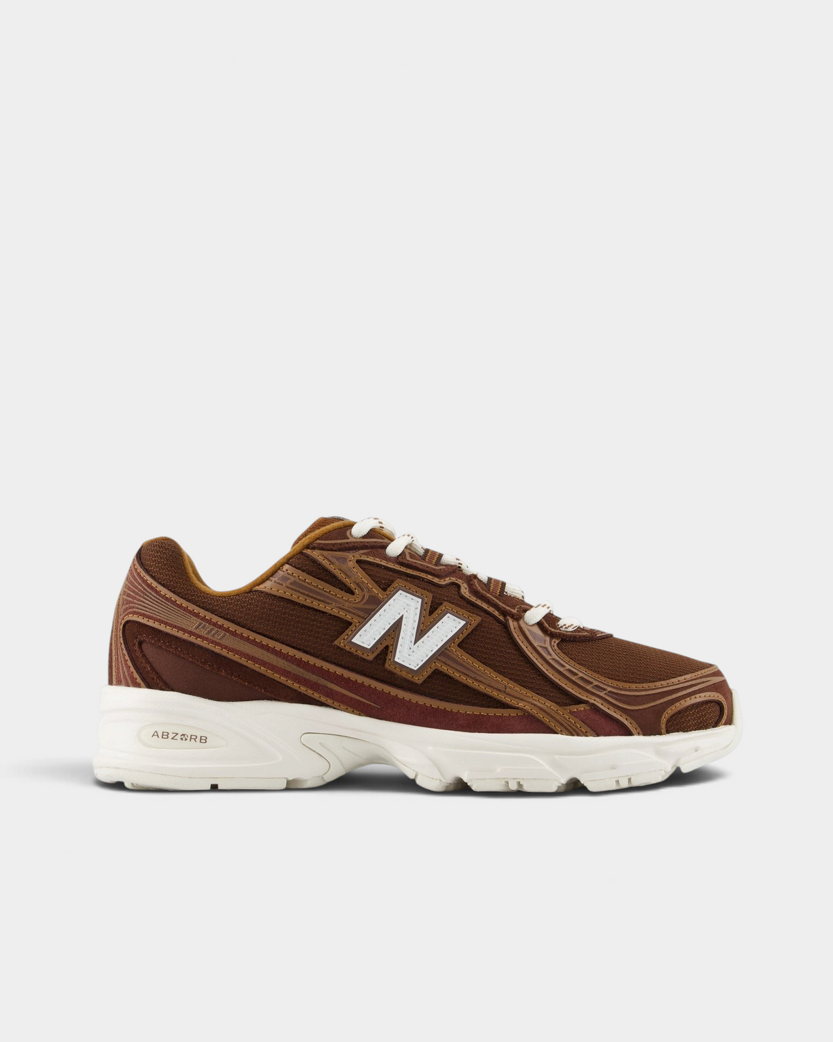 New Balance 740v2 Shoes in Pumpernickel/Sea Salt, side profile: dark brown mesh upper with caramel stitched overlays, a white N logo and a cream chunky midsole