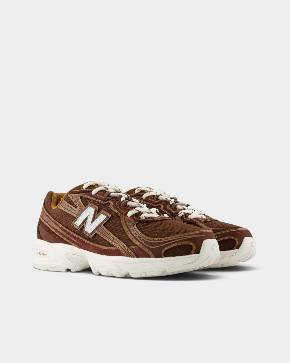 New Balance 740v2 Shoes in Pumpernickel/Sea Salt, pair at a three-quarter front angle showing the brown mesh toe, caramel trim and white N logos