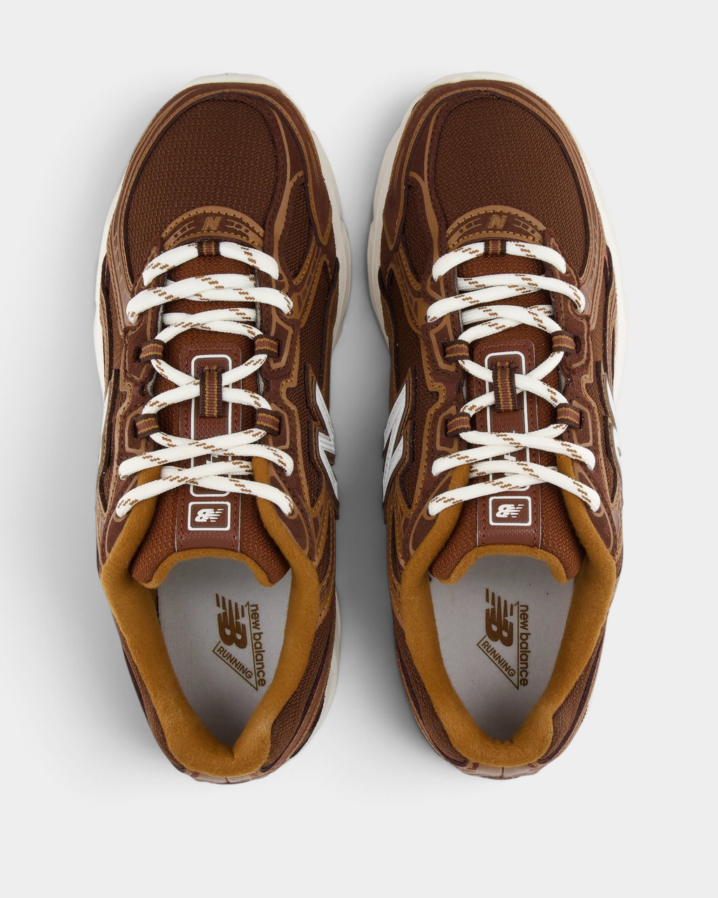 New Balance 740v2 Shoes in Pumpernickel/Sea Salt, pair from above with cream laces over a brown mesh upper and caramel tongue and collar lining