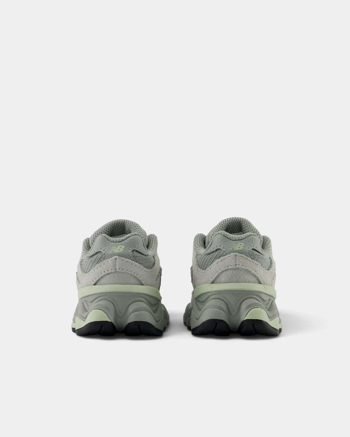 Lockwood Avenue New Balance 9060 Bungee toddler shoes in bayberry green, rear view of the pair showing the heel counters and the black outsole pods