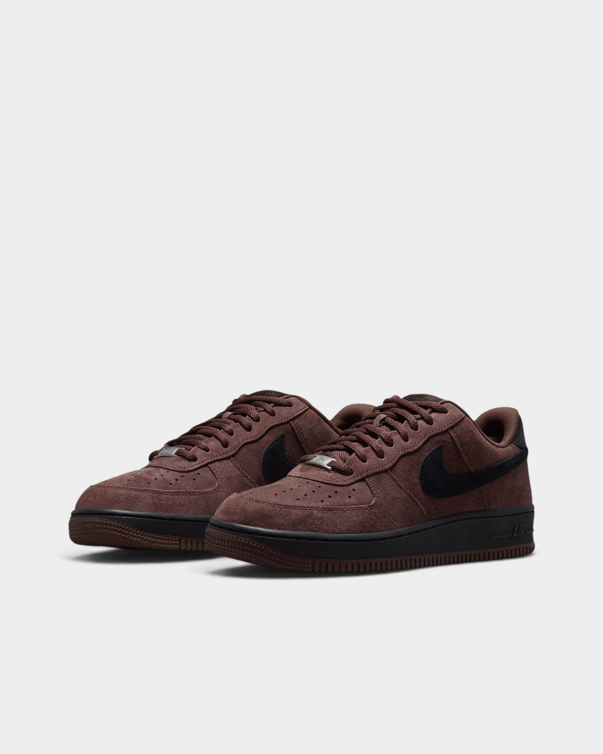 Lockwood Avenue Nike SB Air Force 1 Light Chocolate suede skate shoes, angled pair showing the black Swoosh and the perforated toe