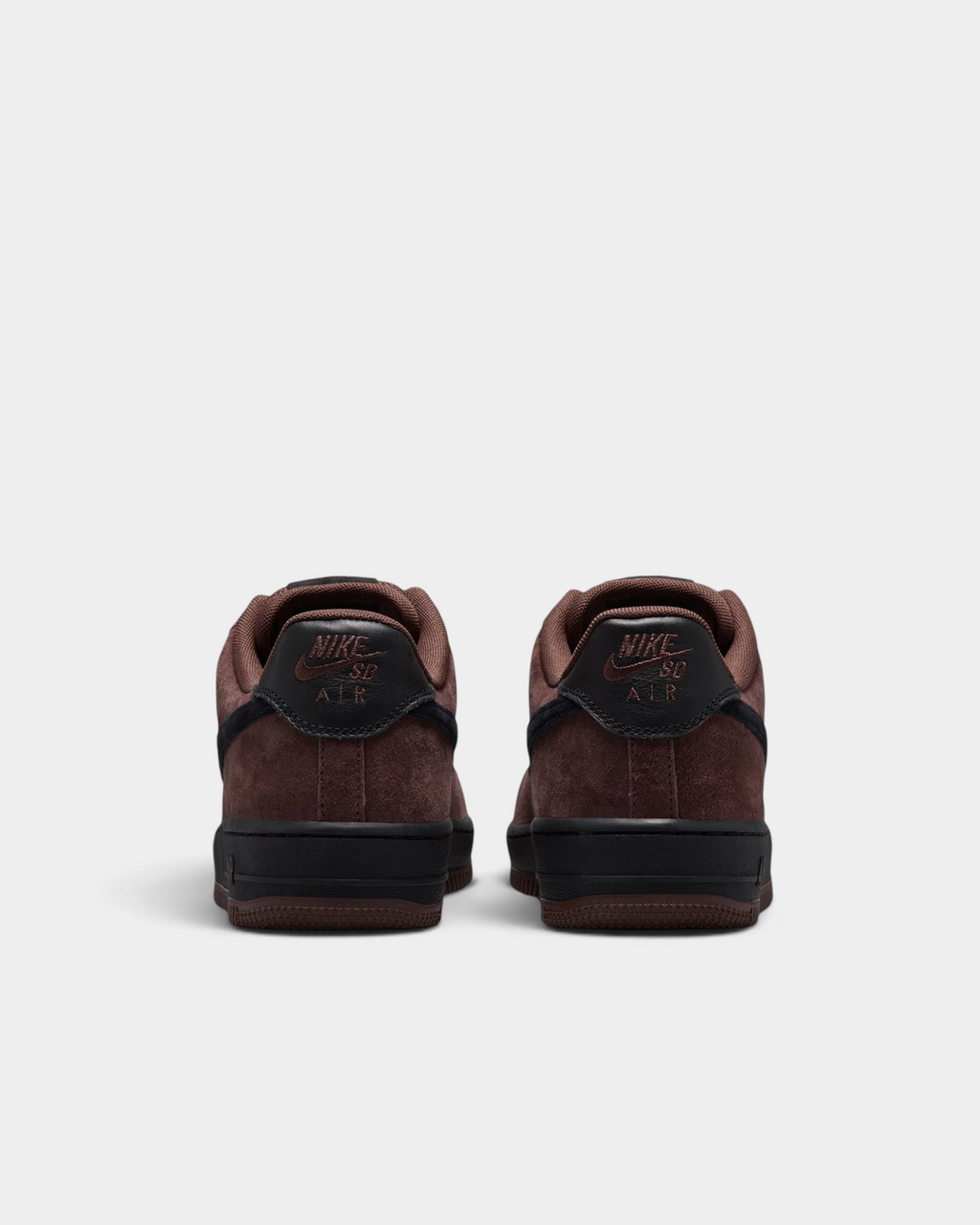 Lockwood Avenue Nike SB Air Force 1 Light Chocolate skate shoes from behind, black heel tabs with Nike Air branding above the brown suede heel