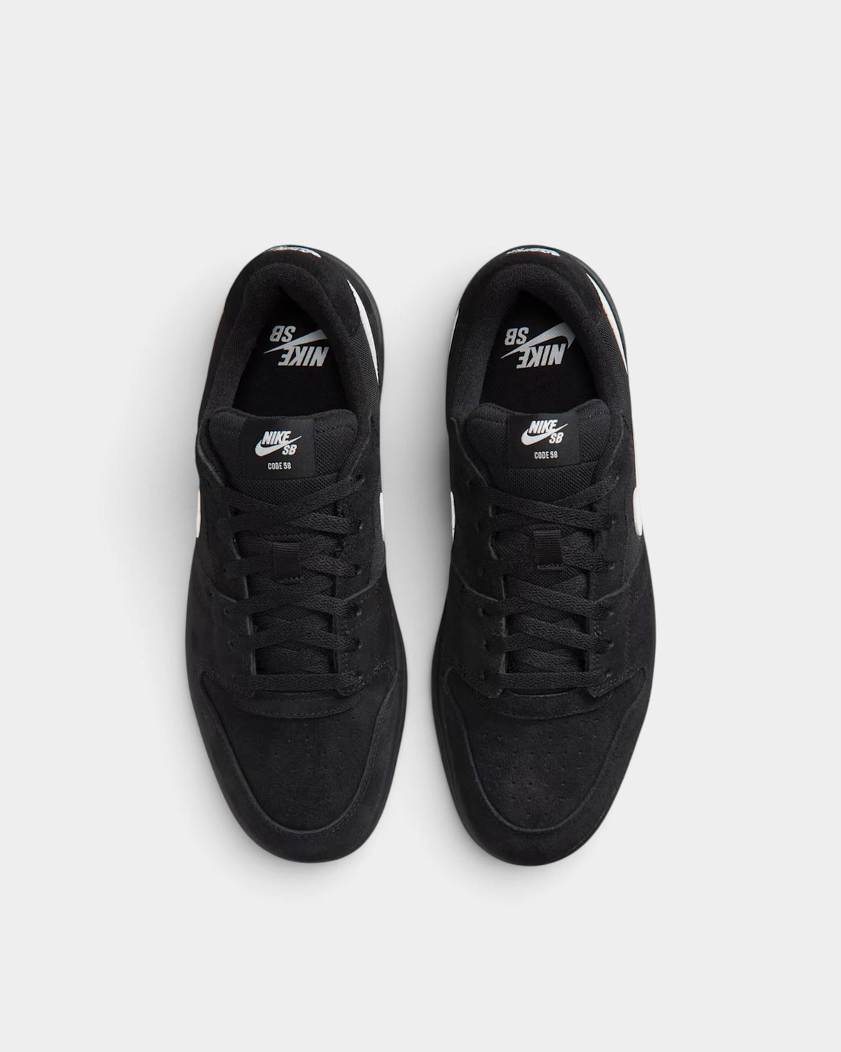 Lockwood Avenue Nike SB Code 58 black suede skate shoes with white branding, viewed from above.