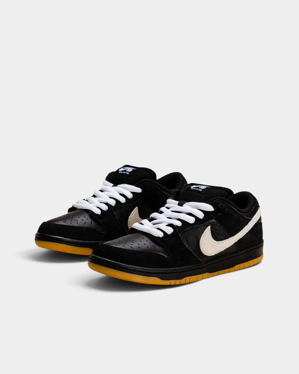 Nike SB Dunk Low Pro Shoes - Black / White / Gum