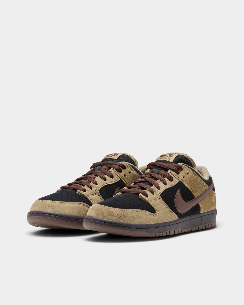 Nike SB Dunk Low Pro Shoes in Filbert/Light Chocolate/Black/Burgundy Ash, the pair at an angle from the front, with the Dunk Low Pro SB tongue label in chocolate brown on tan