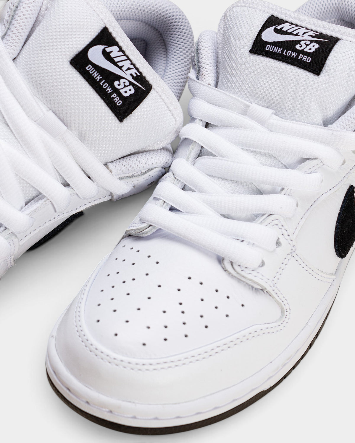 Nike SB Dunk Low Pro Shoes - White / Black