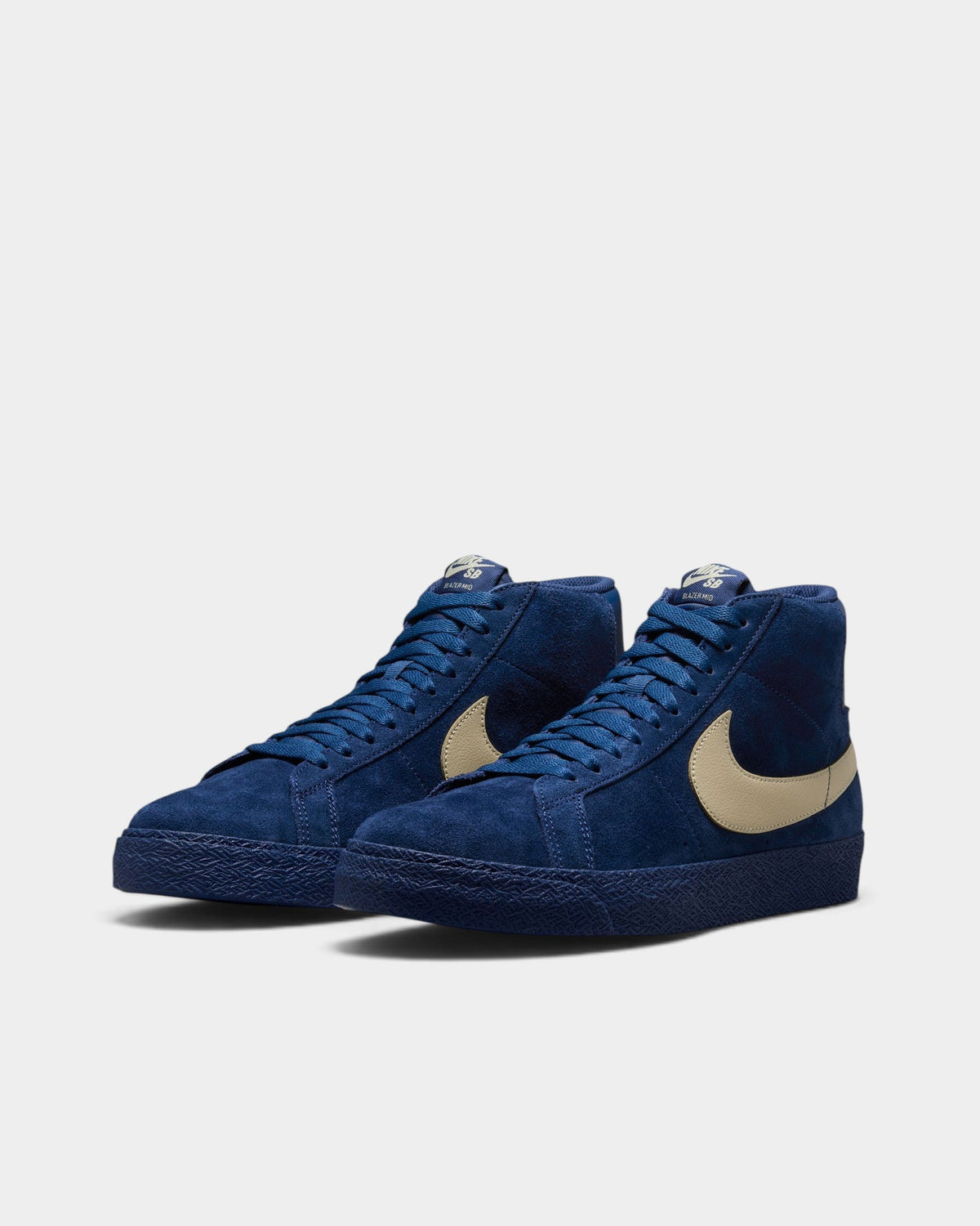 Lockwood Avenue Nike SB Zoom Blazer Mid skate shoes in navy blue suede with a tan leather swoosh