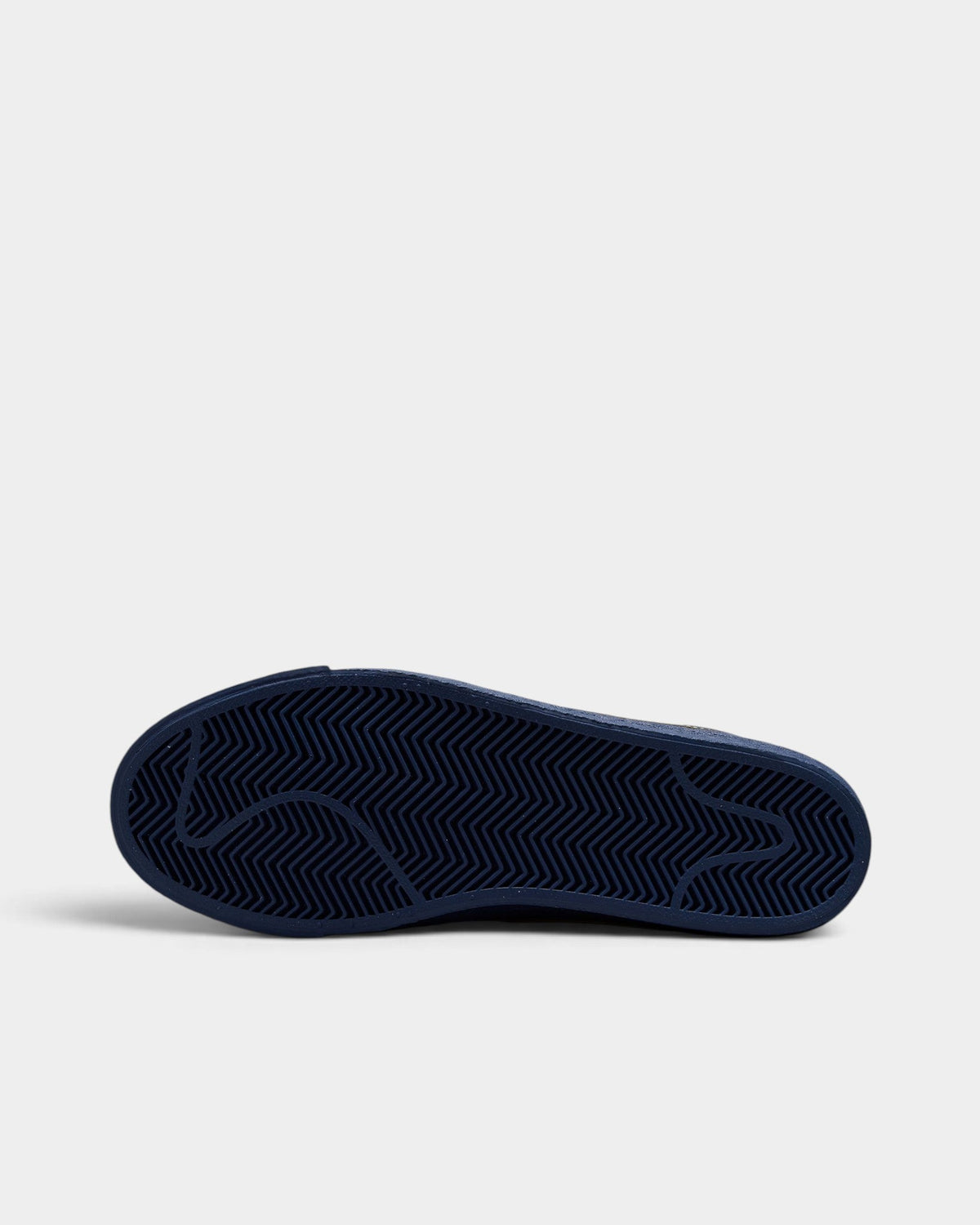 Lockwood Avenue Nike SB Zoom Blazer Mid shoes showing the dark blue rubber herringbone traction outsole