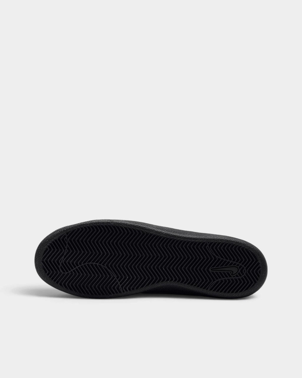Nike SB Zoom Tennis Classic Shoes in Black/Black/Black/Off Noir, the outsole, black herringbone tread facing the camera