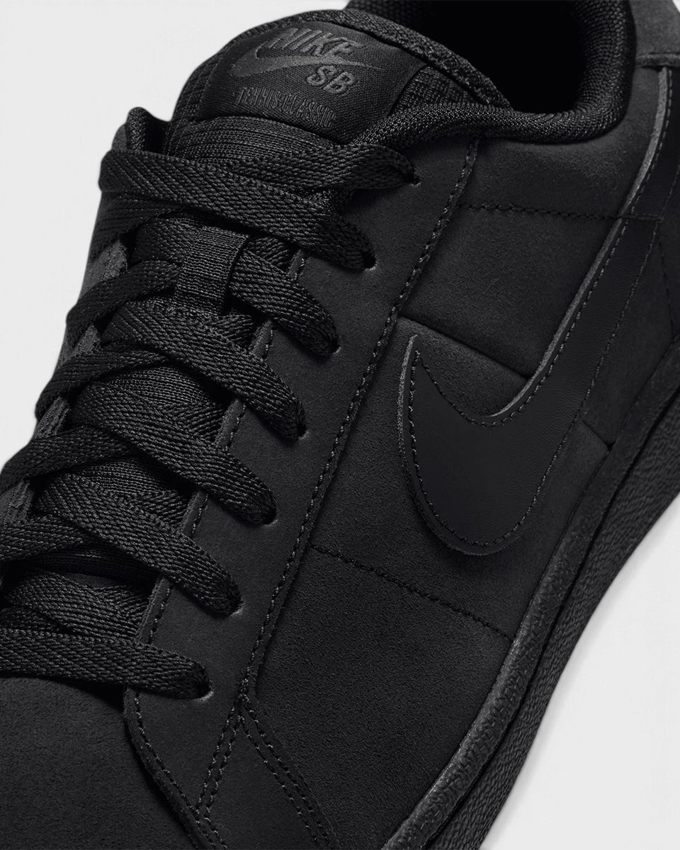 Nike SB Zoom Tennis Classic Shoes in Black/Black/Black/Off Noir, close-up of the laces and the tonal Swoosh on the black nubuck