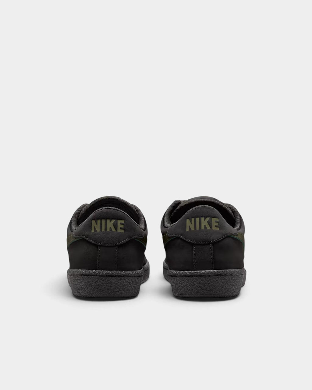 Lockwood Avenue Nike SB Zoom Tennis Classic black leather skate shoes, rear view showing olive green heel branding.
