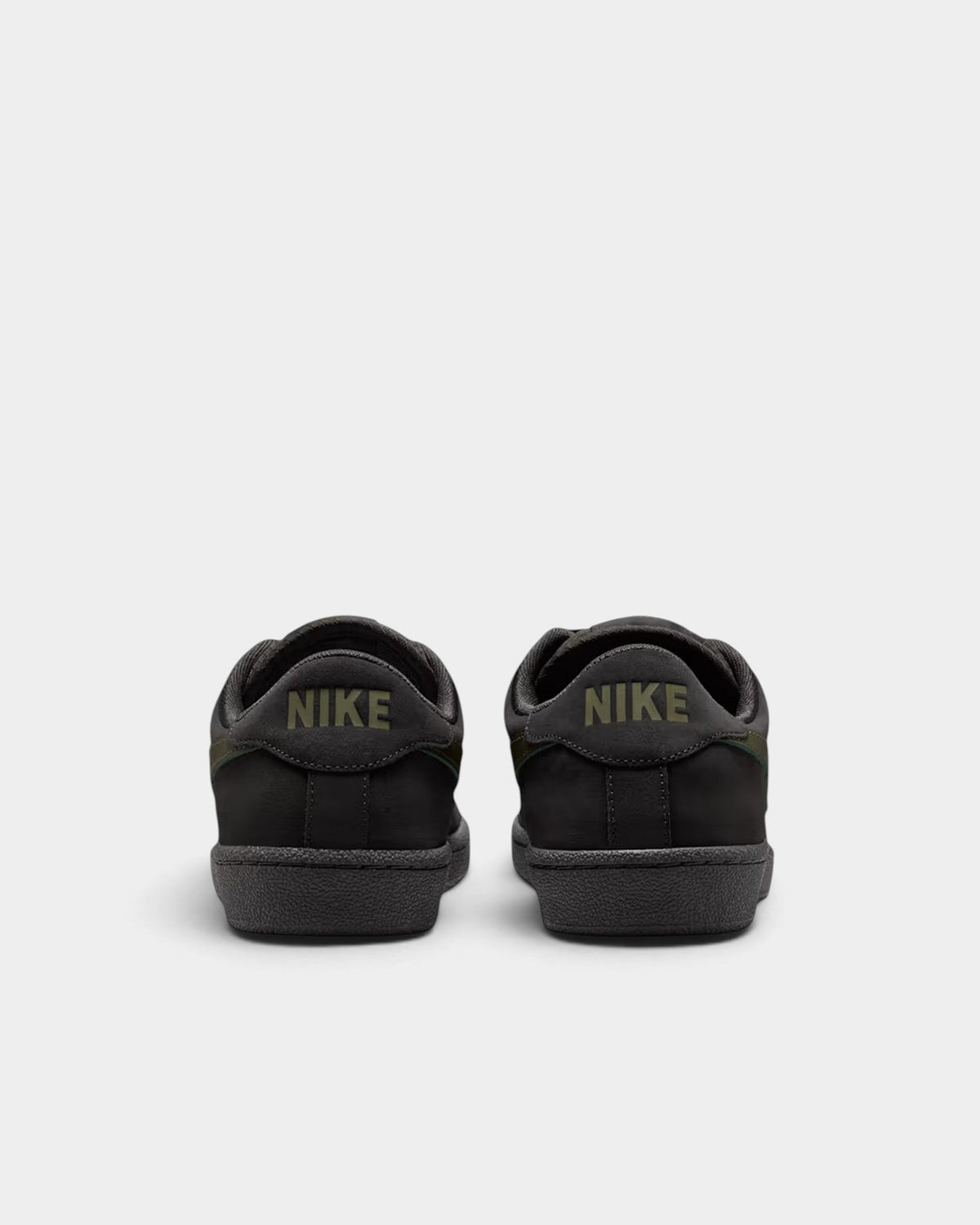 Lockwood Avenue Nike SB Zoom Tennis Classic black leather skate shoes, rear view showing olive green heel branding.