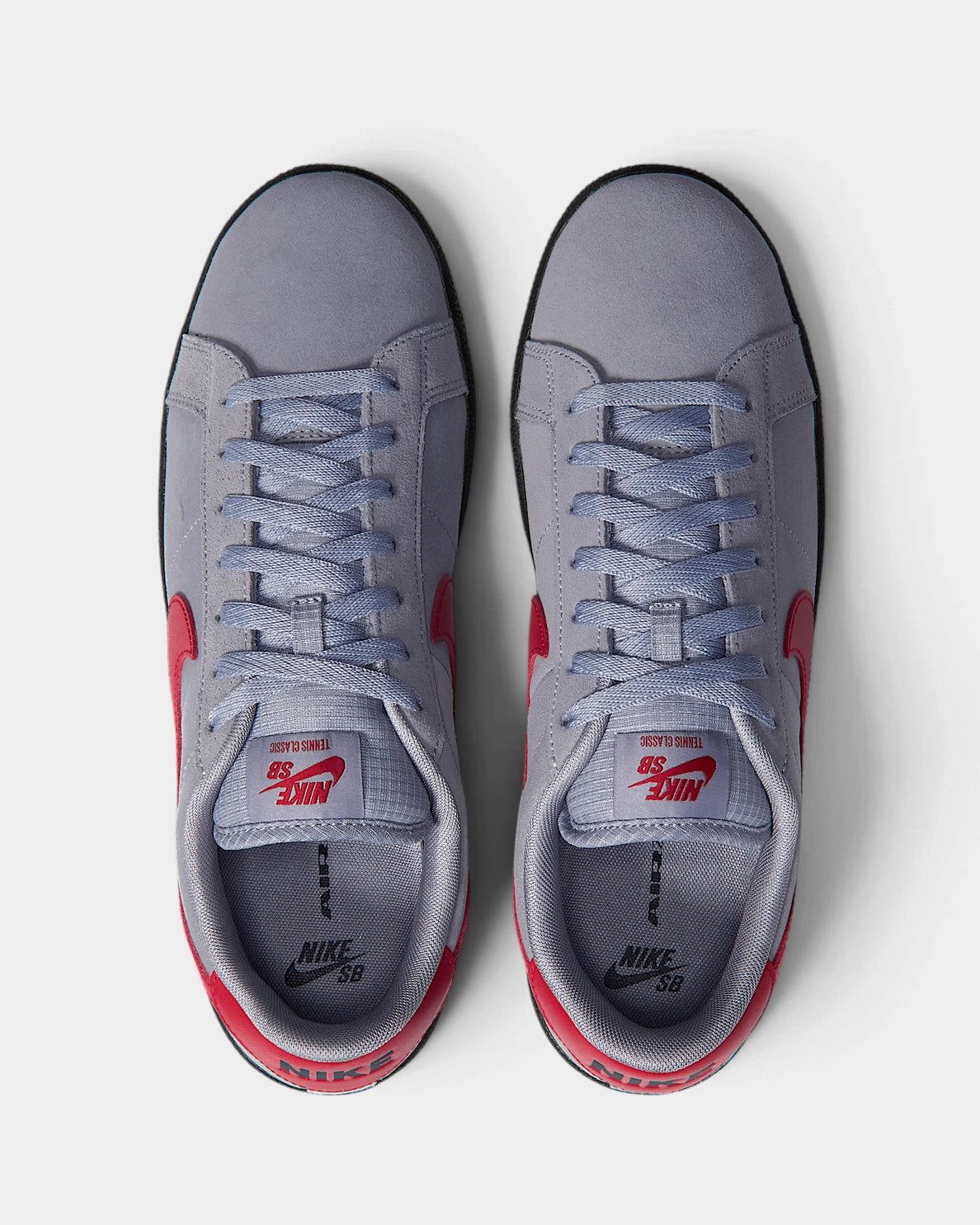 Nike SB Zoom Tennis Classic Shoes in Stealth/Gym Red/Black, both shoes from above, toes up, showing the grey laces and red tongue label