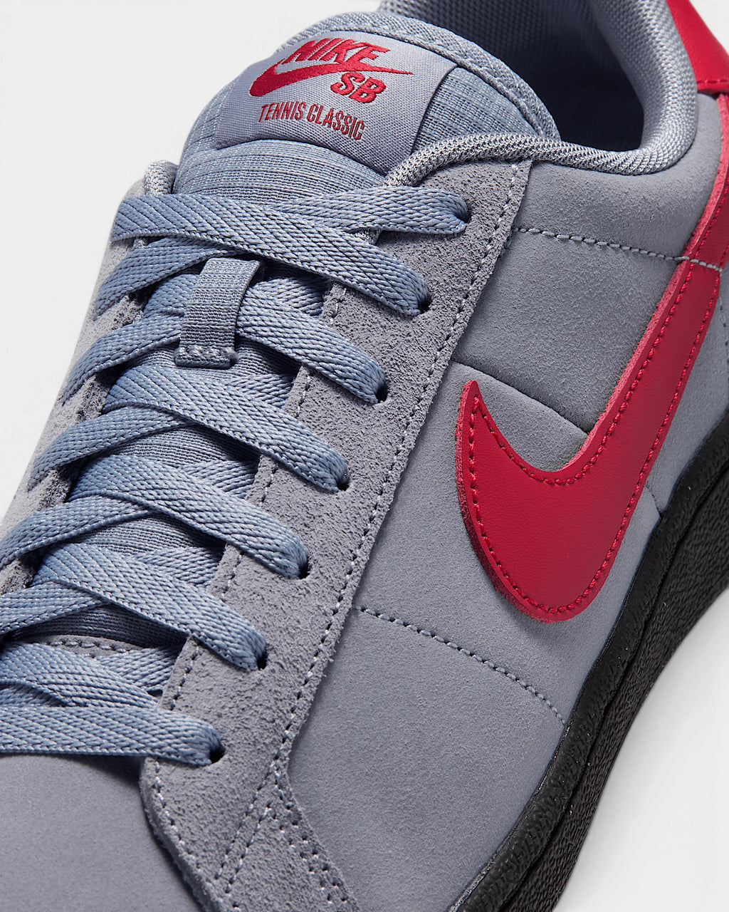 Nike SB Zoom Tennis Classic Shoes in Stealth/Gym Red/Black, close-up of the laces, red Swoosh and the Nike SB Tennis Classic tongue label