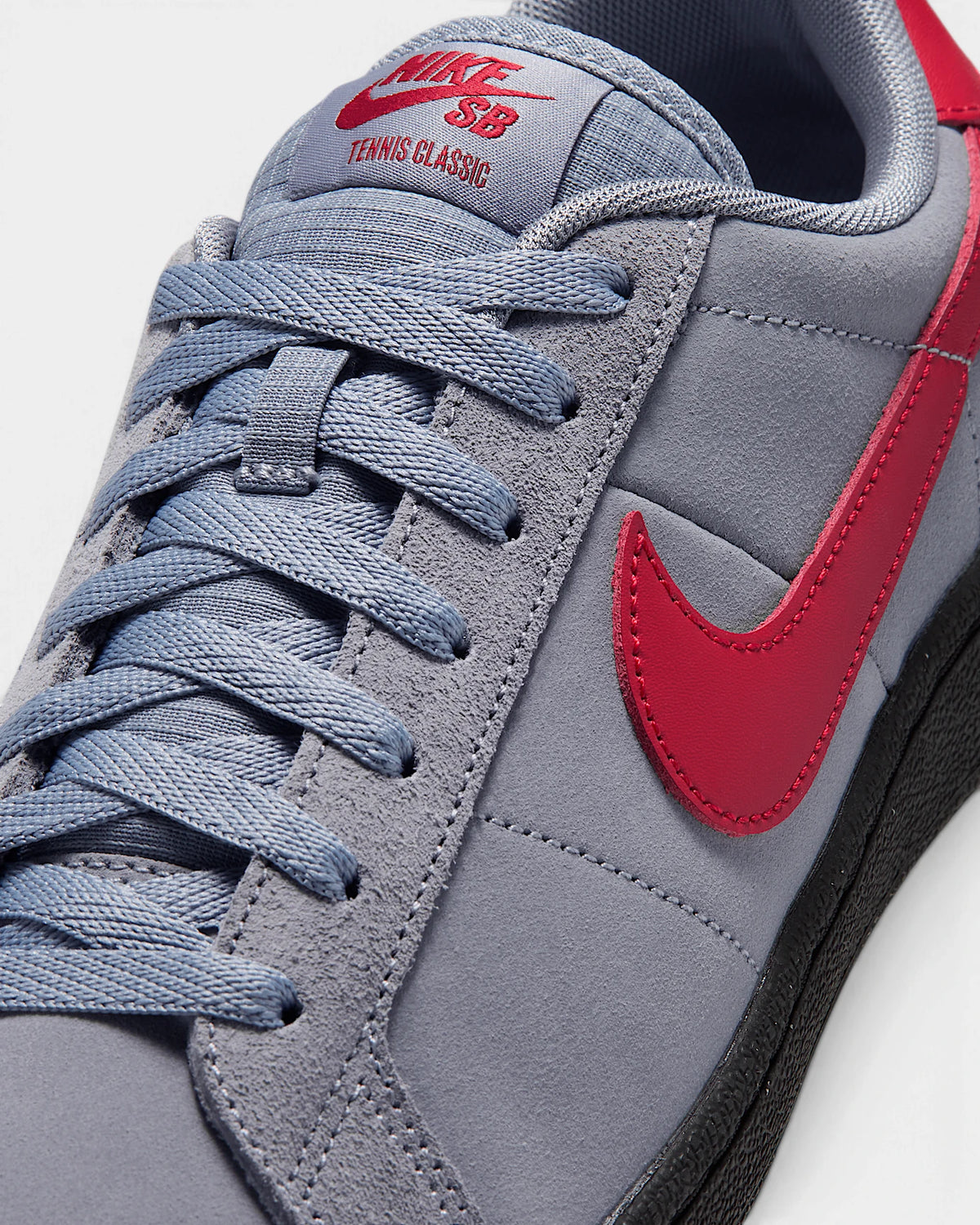 Nike SB Zoom Tennis Classic Shoes in Stealth/Gym Red/Black, close-up of the laces, red Swoosh and the Nike SB Tennis Classic tongue label