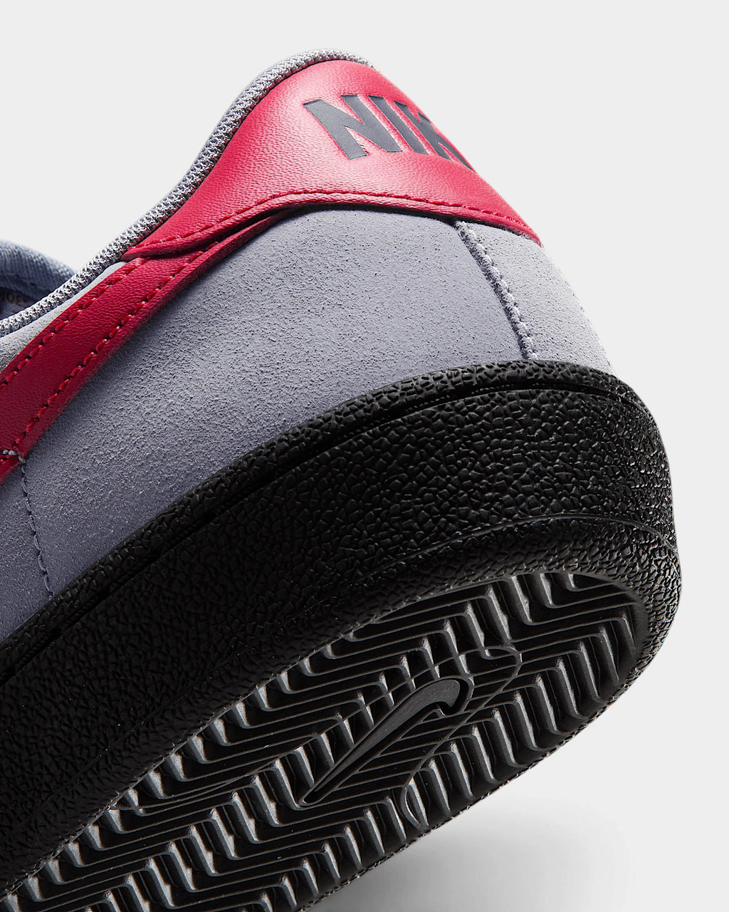Nike SB Zoom Tennis Classic Shoes in Stealth/Gym Red/Black, close-up of the red heel tab and the black sole edge