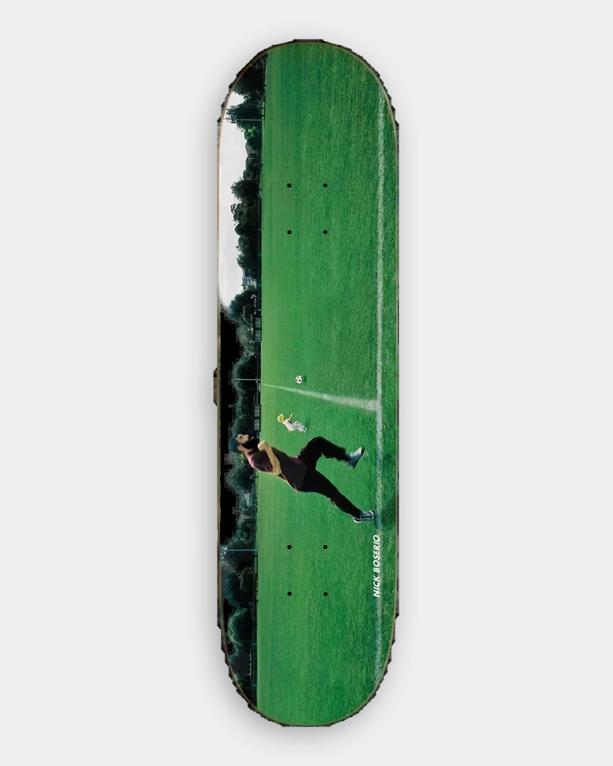 Lockwood Avenue Polar Nick Boserio Run Cleo Deck 8.5" skateboard deck featuring a night photograph printed edge to edge, a figure running across a floodlit green field with dark trees down one side
