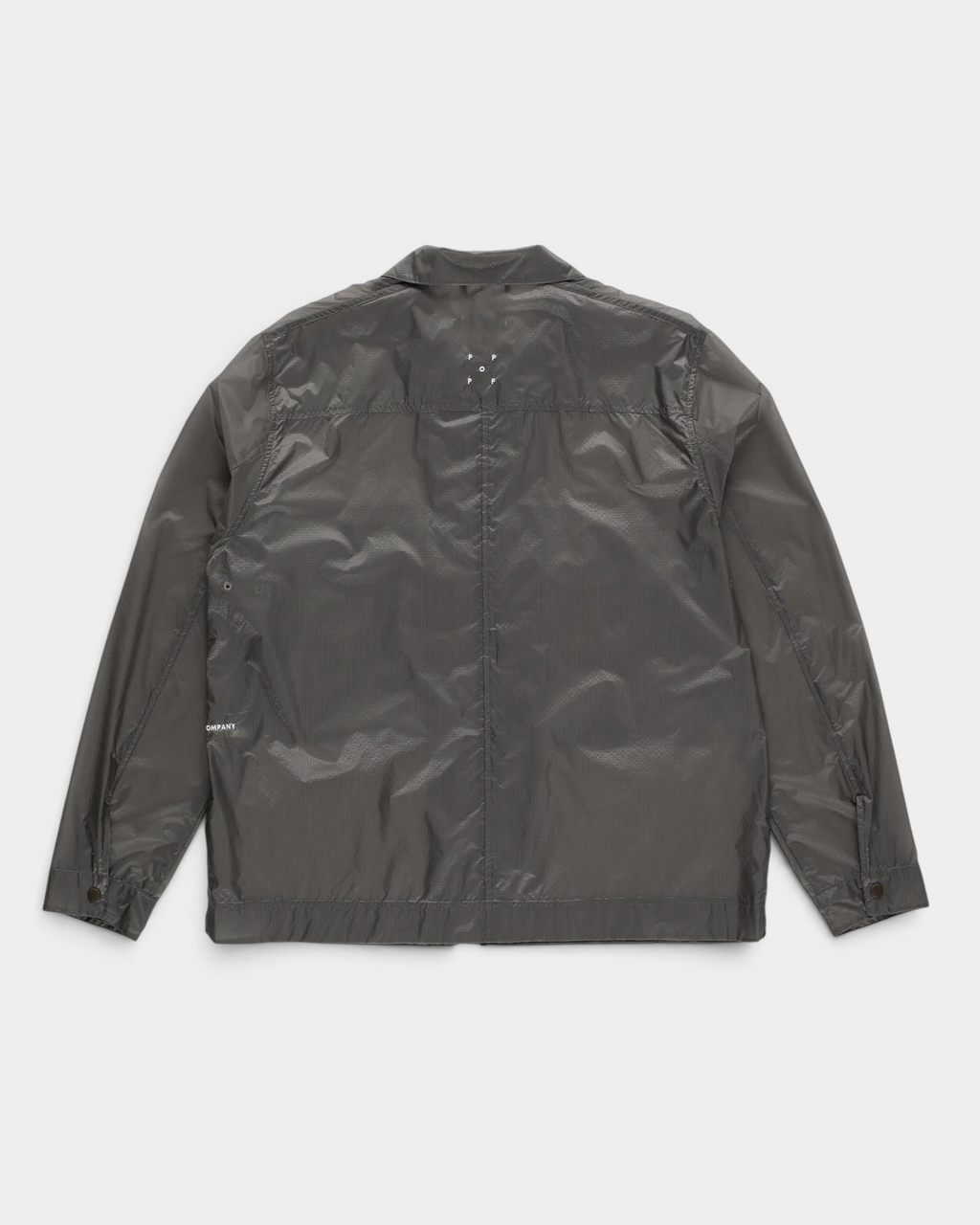 POP Trading Company Box overshirt in charcoal ripstop nylon with a full zip, a camp collar and two flap chest pockets