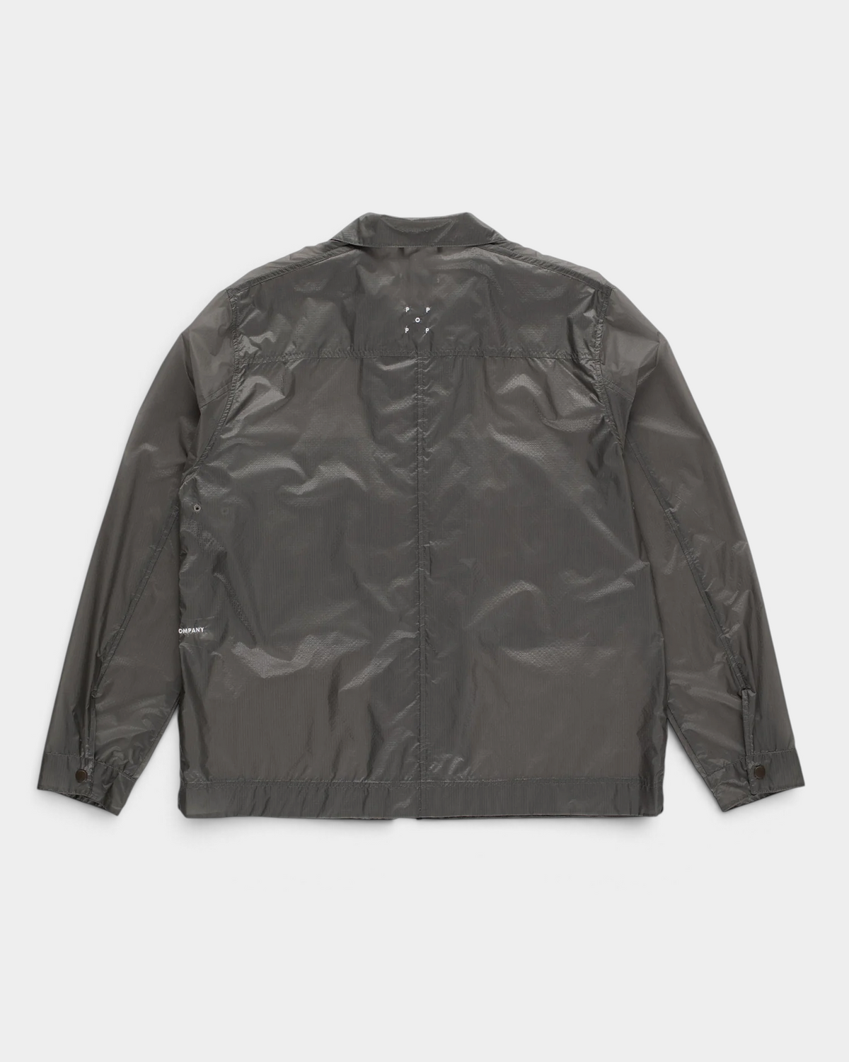 POP Trading Company Box overshirt in charcoal ripstop nylon with a full zip, a camp collar and two flap chest pockets