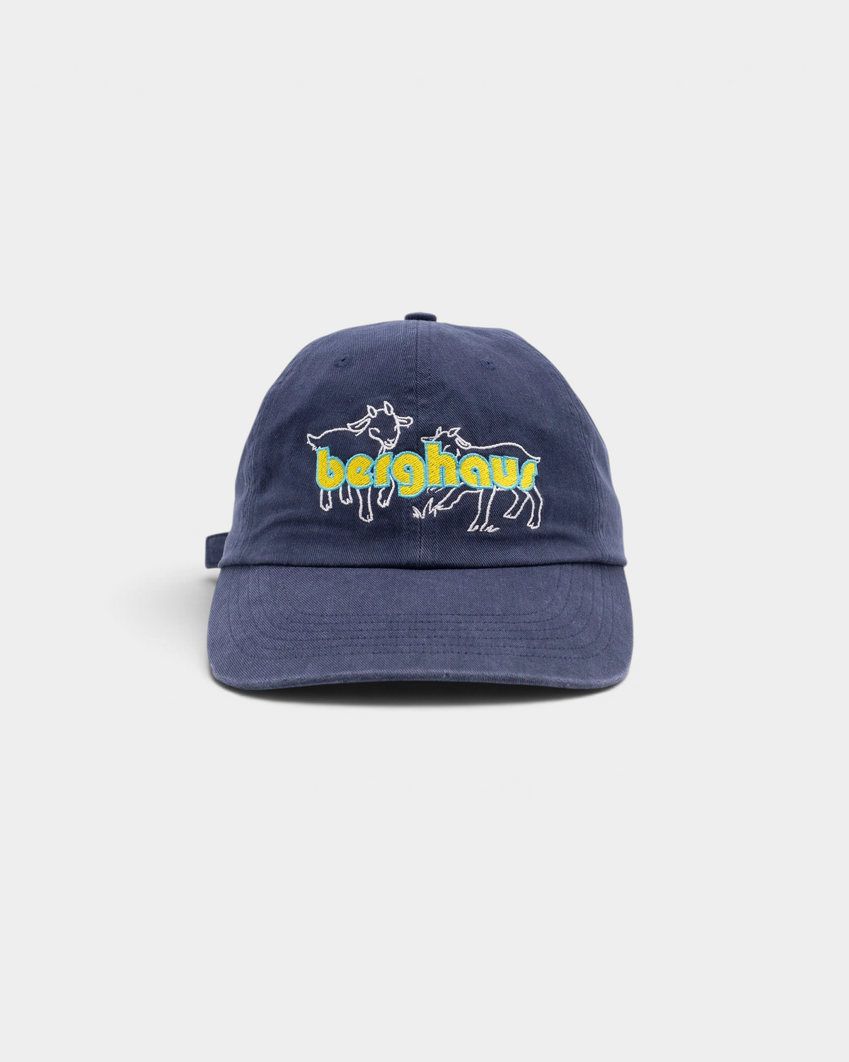 Pop Trading Company x Berghaus Berggoat six panel cap in navy, front, with two outlined goats and the word berghaus embroidered in yellow and light blue