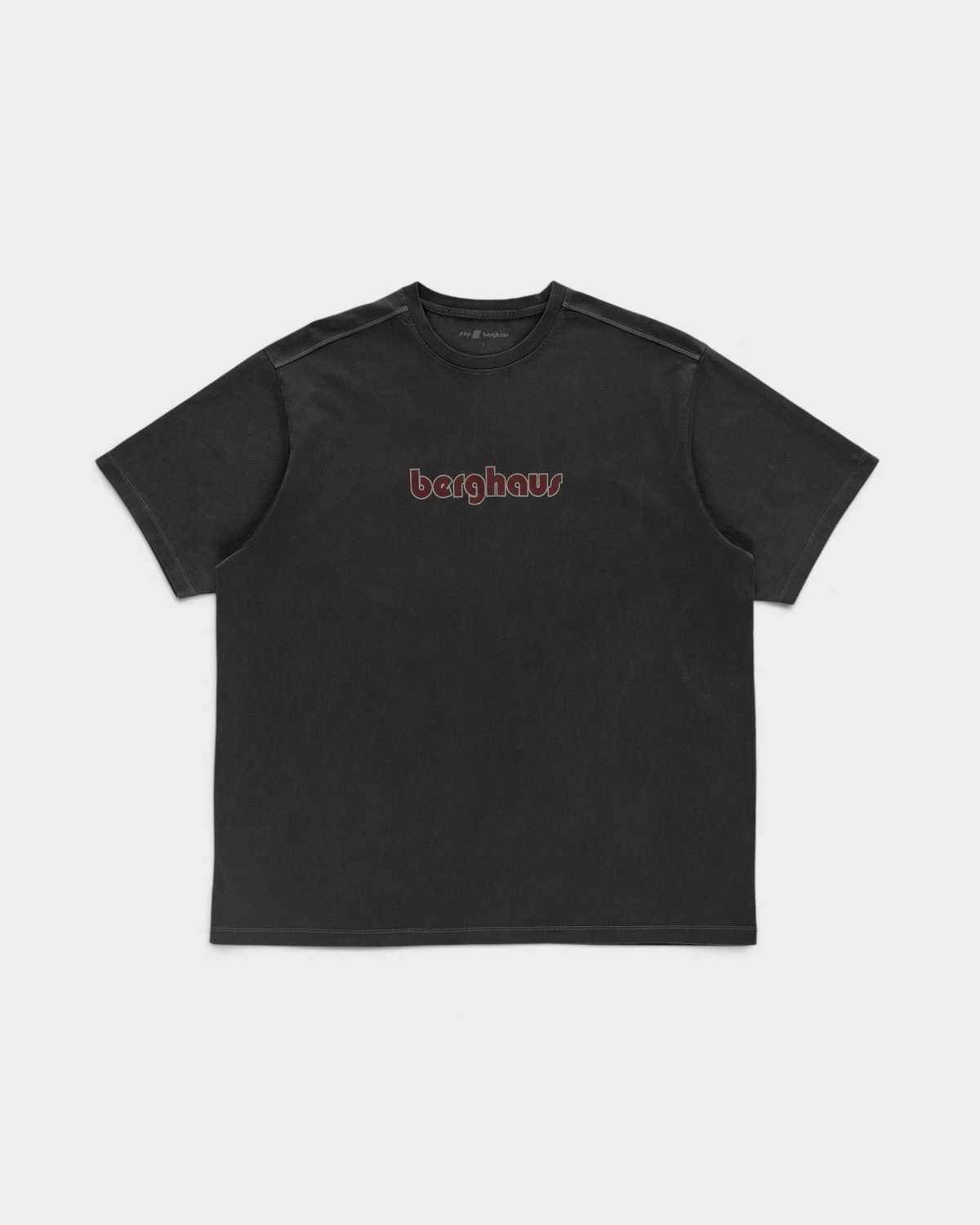 Pop Trading Company x Berghaus logo t-shirt in washed black, front, with the berghaus logo across the chest in dark red outlined in grey