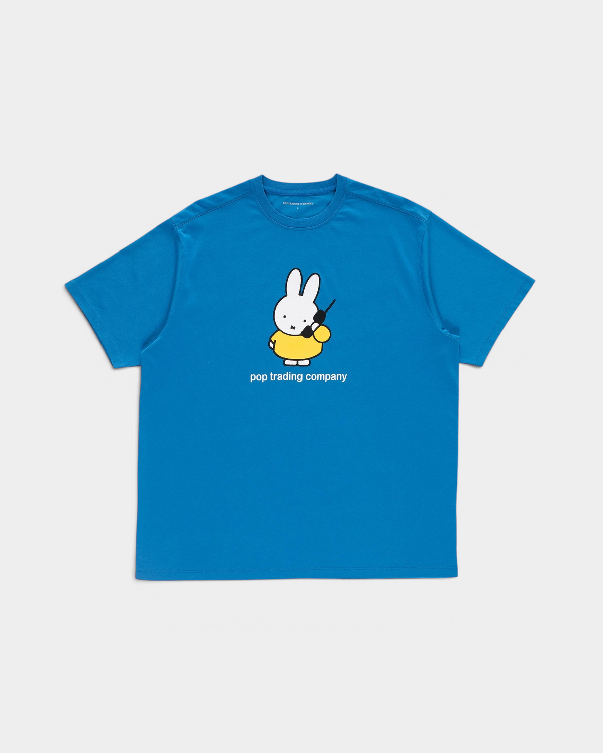 Pop Trading Company x Miffy Calling T-shirt in blue, front, with Miffy in a yellow dress above the words pop trading company