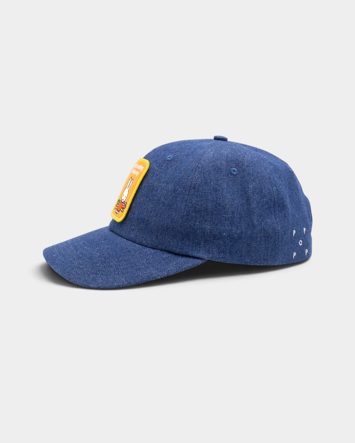 Pop Trading Company x Miffy patch six panel cap in rinsed denim, side view with the yellow Miffy patch