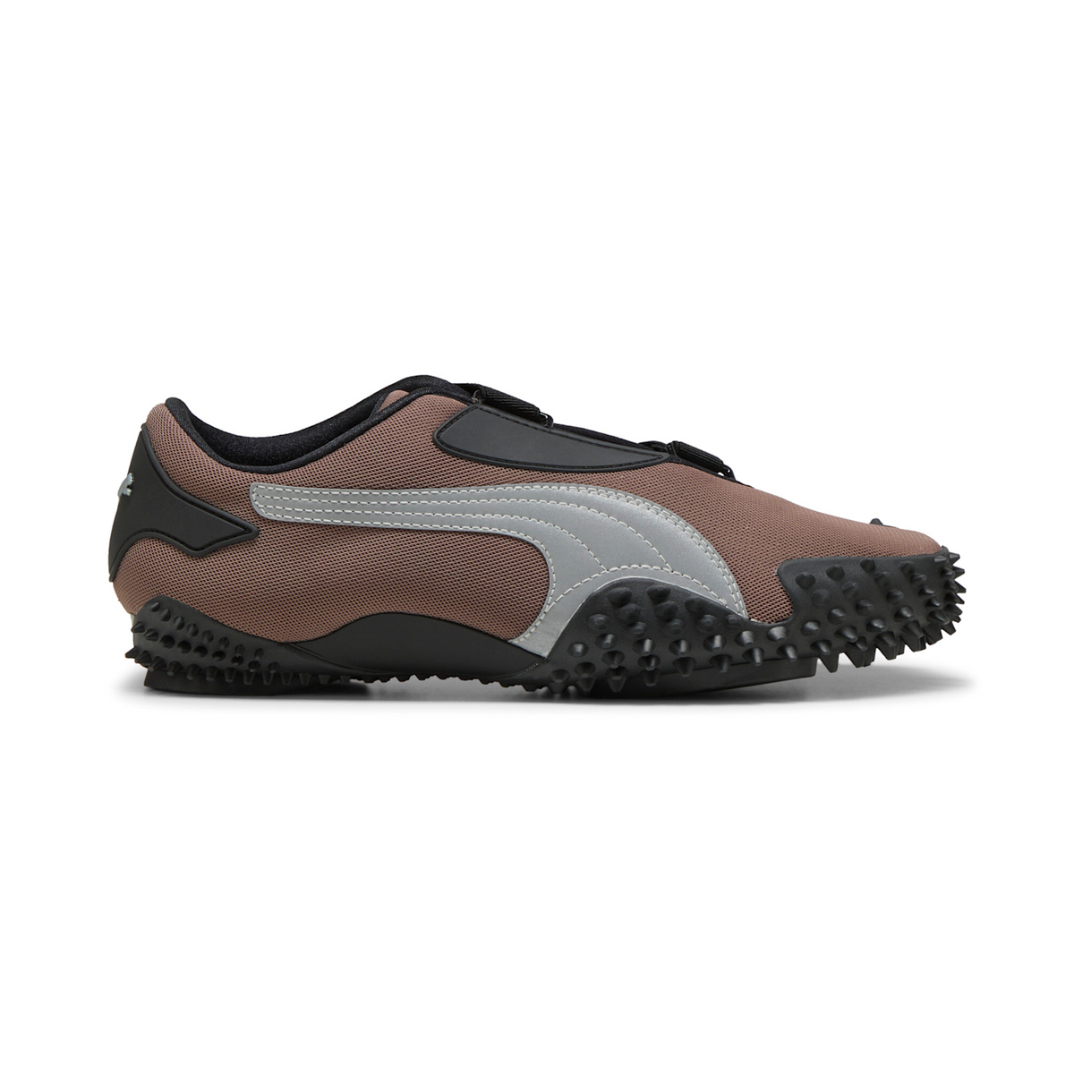 Puma Mostro OG in Dark Clove and Puma Silver, lateral profile of the low slip-on with the silver formstrip running the length of the mesh upper and spikes wrapping up the sidewall