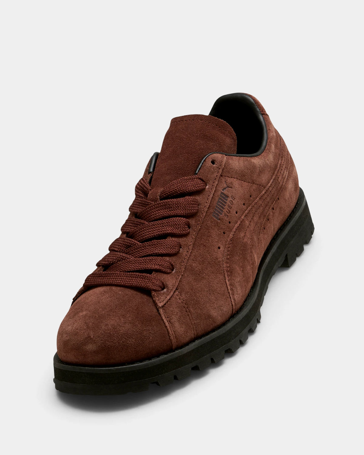 Puma Suede Vibram Shoes in Chocotart/Puma Black, right shoe from a raised three-quarter angle, showing the chocolate brown suede upper on a black lugged Vibram outsole
