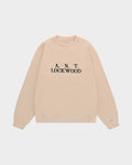 Lockwood Initials Antwerp Crewneck Sweatshirt in Tan, flat-lay front with the A.N.T. Lockwood logo embroidered in black on the chest