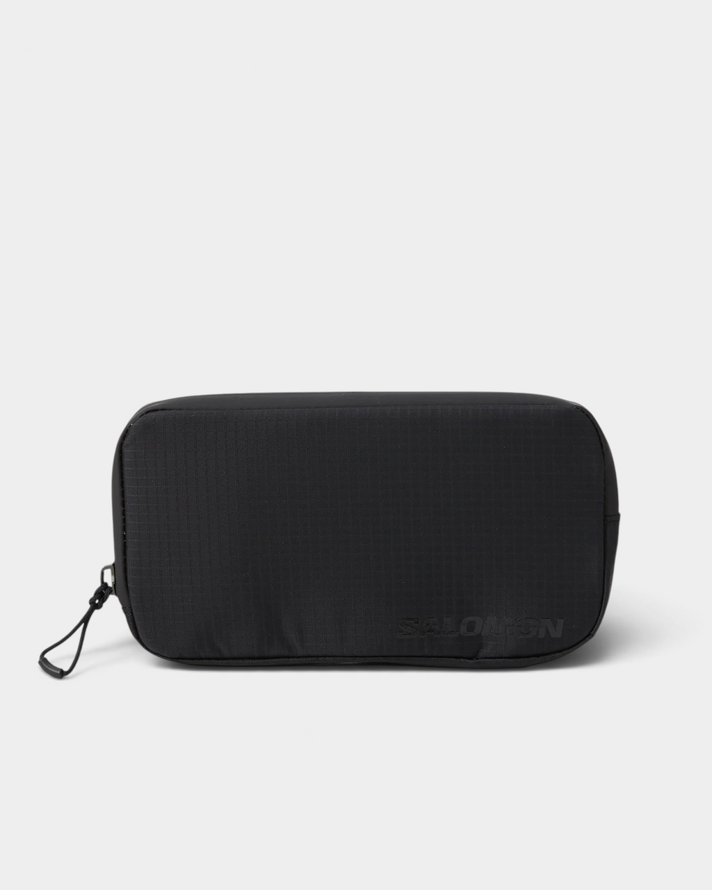Salomon ACS Essentials Case in black, front view of the flat rectangular ripstop zip case showing the tonal SALOMON logo and the corded zip pull at the left