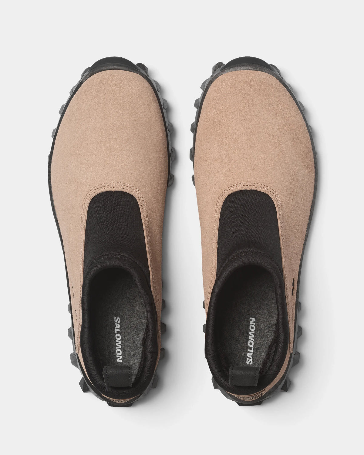 Salomon Snowclog OG Shoes in Safari/Black/Black, both shoes from above, showing the sand-coloured slip-on upper with a black collar and a black lugged sole