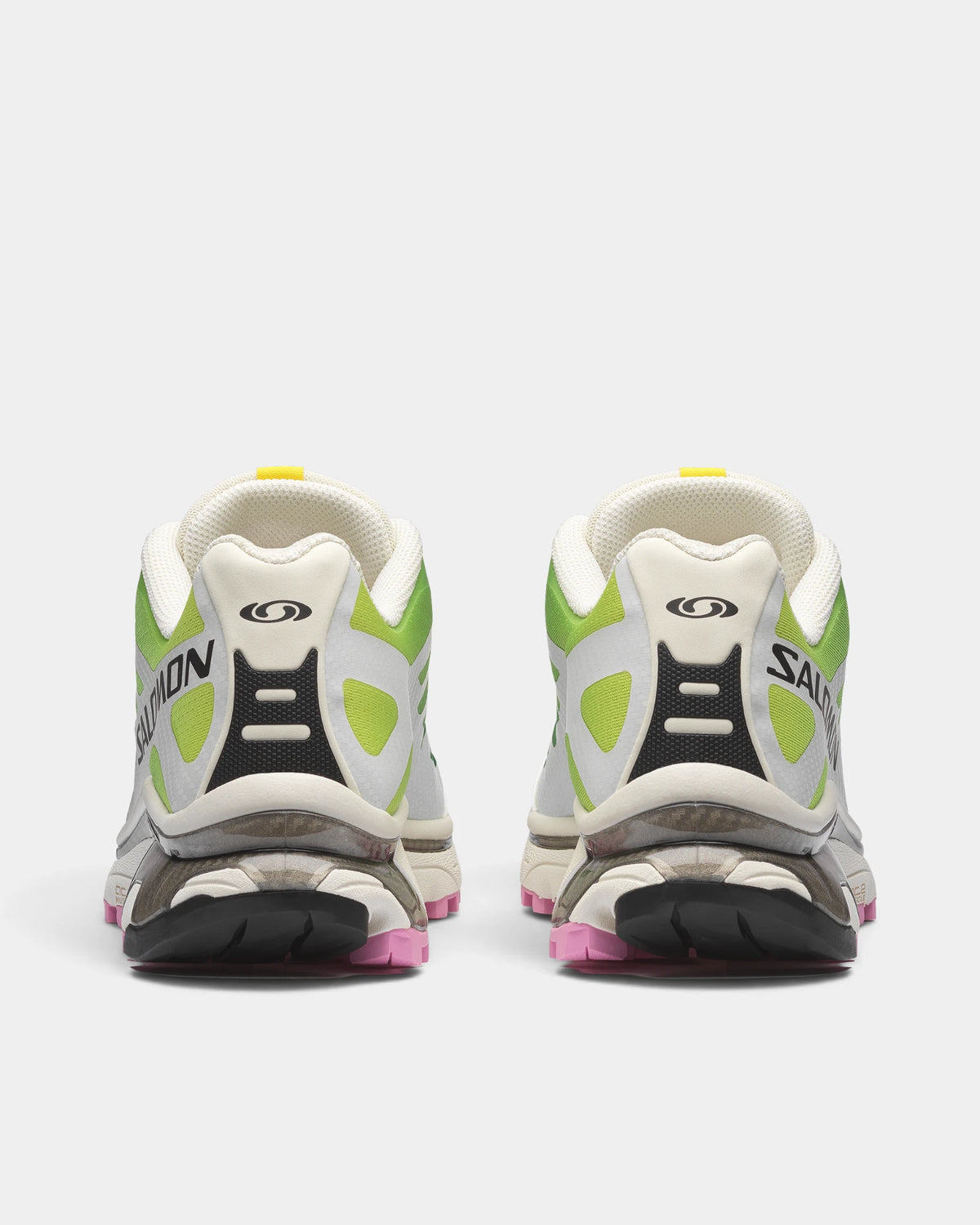 Salomon XT-4 OG Shoes in Vanilla Ice/Acid Lime/Pink Frosting, both shoes from behind, showing the off-white and green mesh upper with pink accents on a chunky sole