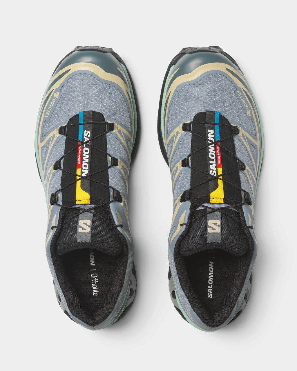 Salomon XT-6 Gore-Tex Shoes in Tradewinds/Stormy Weather/Bog, both shoes from above, showing the light blue-grey upper with sand overlays and dark green accents on a black sole