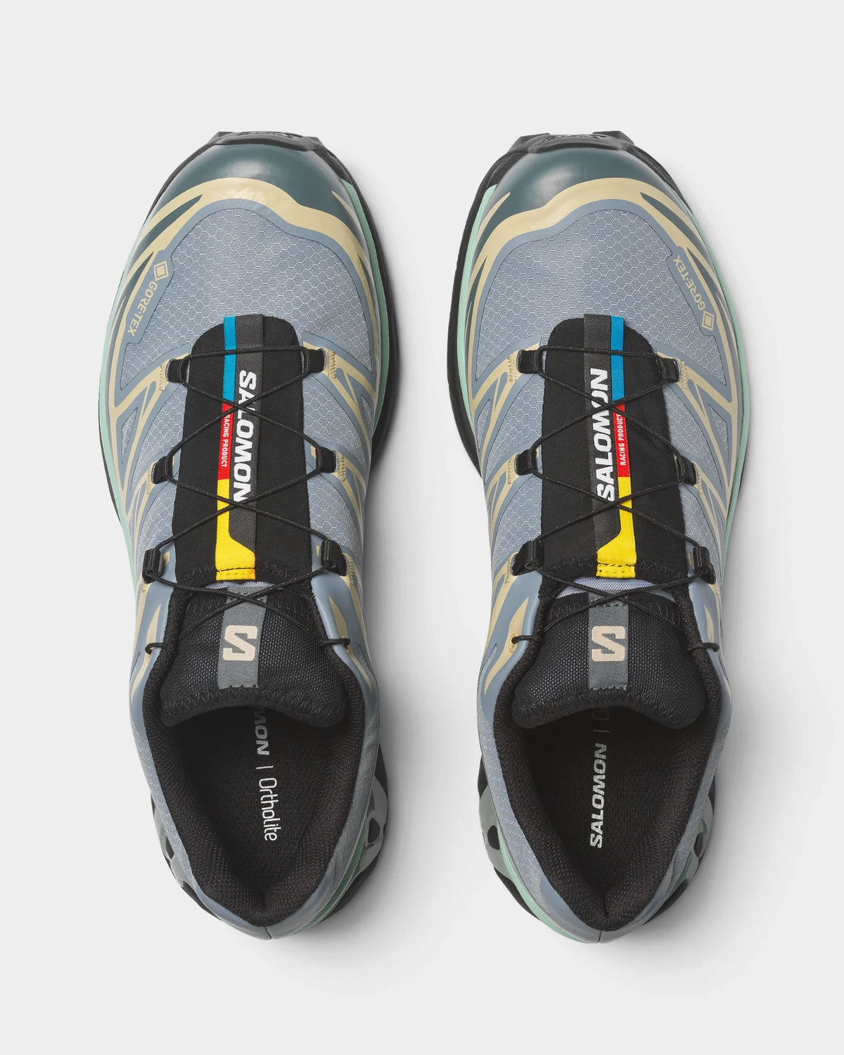 Salomon XT-6 Gore-Tex Shoes in Tradewinds/Stormy Weather/Bog, both shoes from above, showing the light blue-grey upper with sand overlays and dark green accents on a black sole