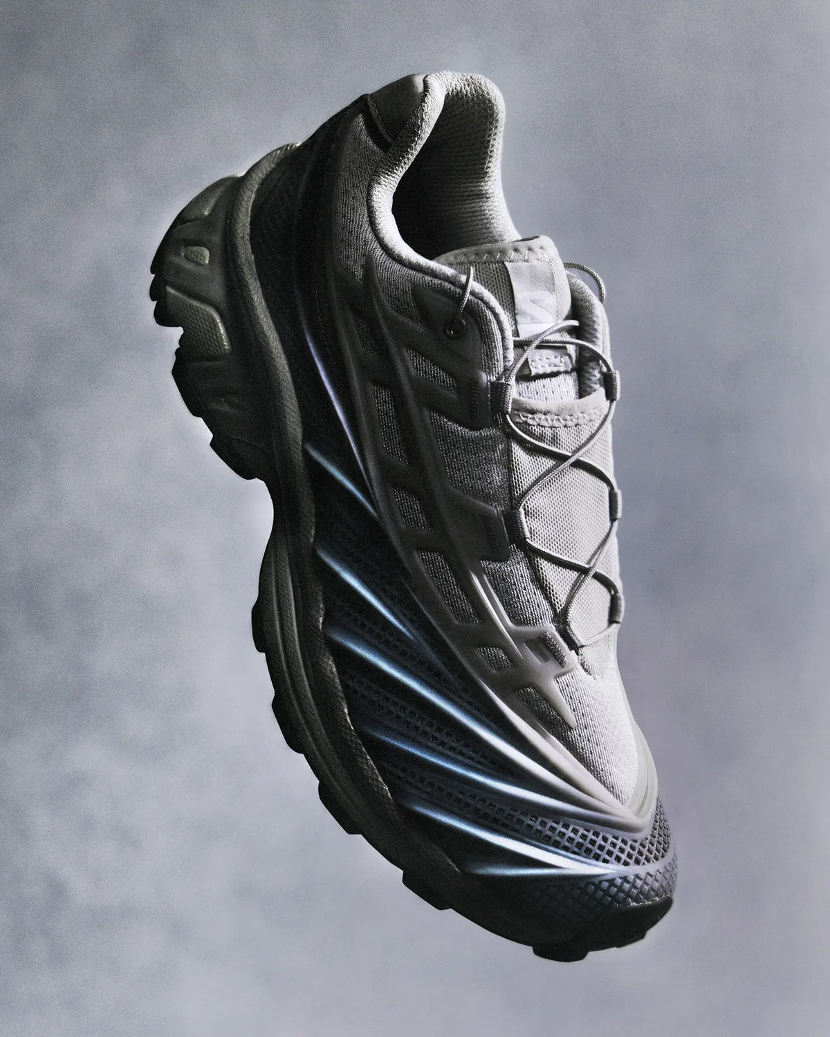 Salomon XT-EVO Shoes in Alloy/Castlerock/Footwear Silver, single shoe at a three-quarter angle, suspended against a grey studio backdrop