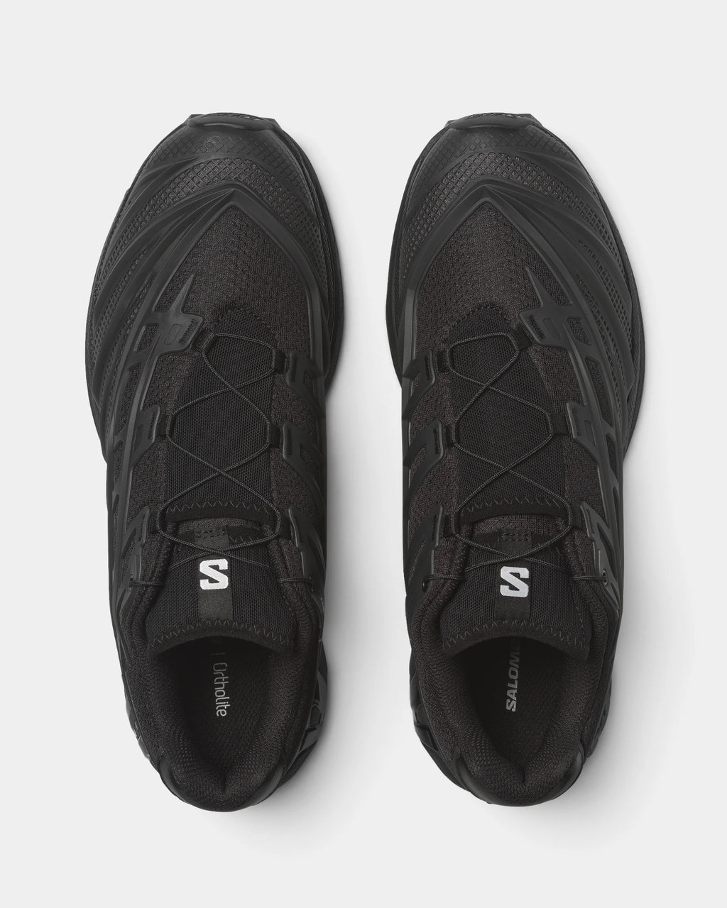 Salomon XT-EVO Shoes in Black/Black/Asphalt, both shoes from above, showing the all-black layered upper on a black sculpted sole
