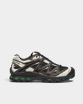 Salomon XT-Quest Gore-Tex Shoes in Black/Delicioso/Green Jacket, right shoe in side profile, showing the black and brown upper with off-white panels on a black sole with green accents