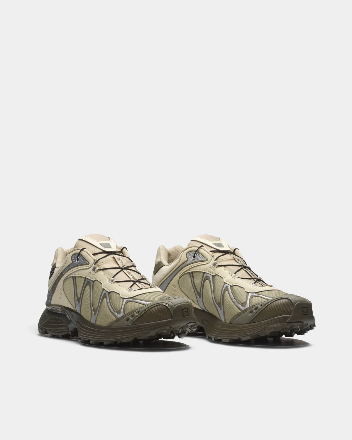 Salomon XT-Whisper Gore-Tex Shoes in Asparagus Green/Deep Lichen Green/Grape Leaf, both shoes from a three-quarter front angle, showing the pale and deep green Gore-Tex upper on a dark green sole