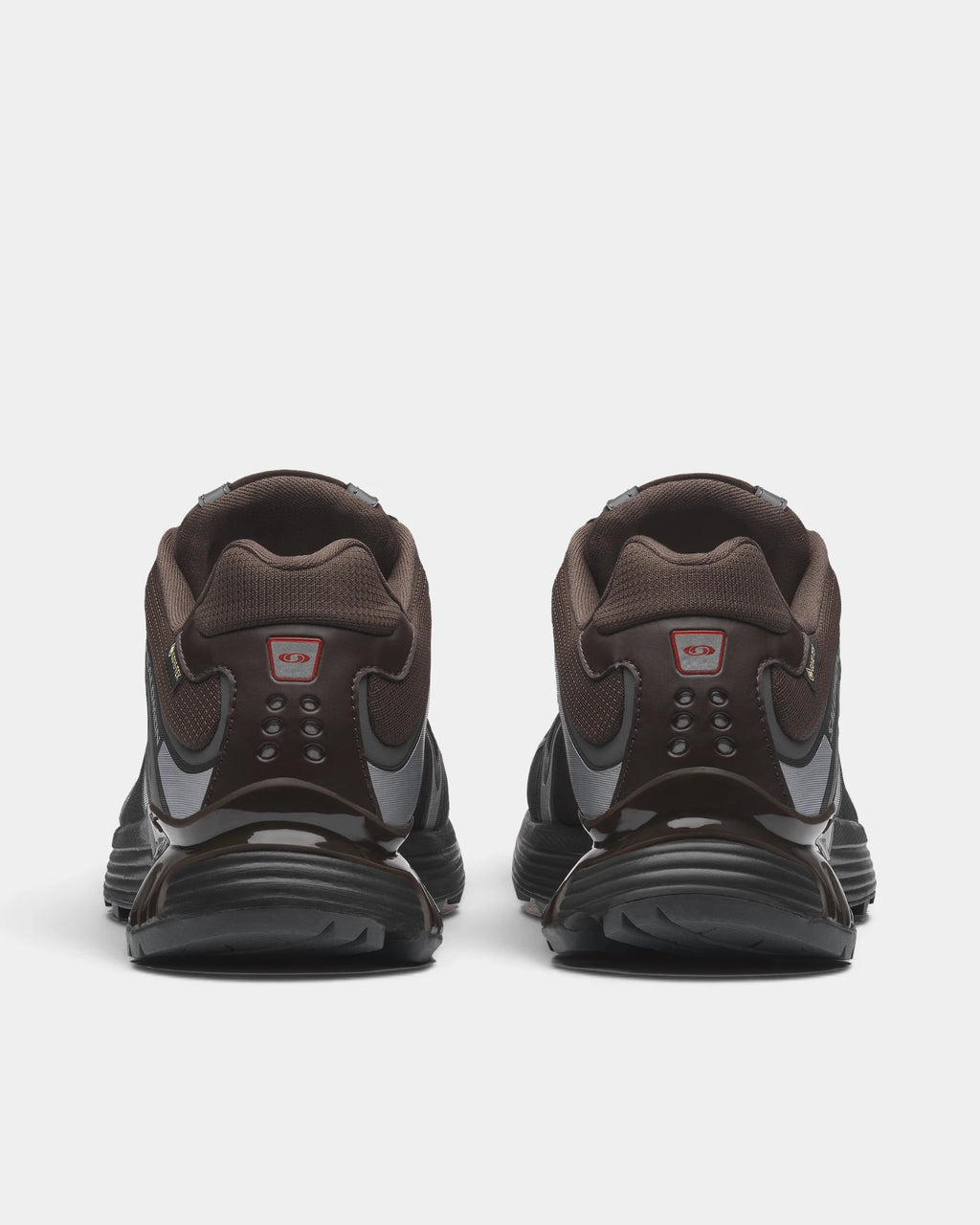 Salomon XT-Whisper Gore-Tex Shoes in Delicioso/Asphalt/Castlerock, both shoes from behind, showing the dark brown and grey Gore-Tex upper on a black sole