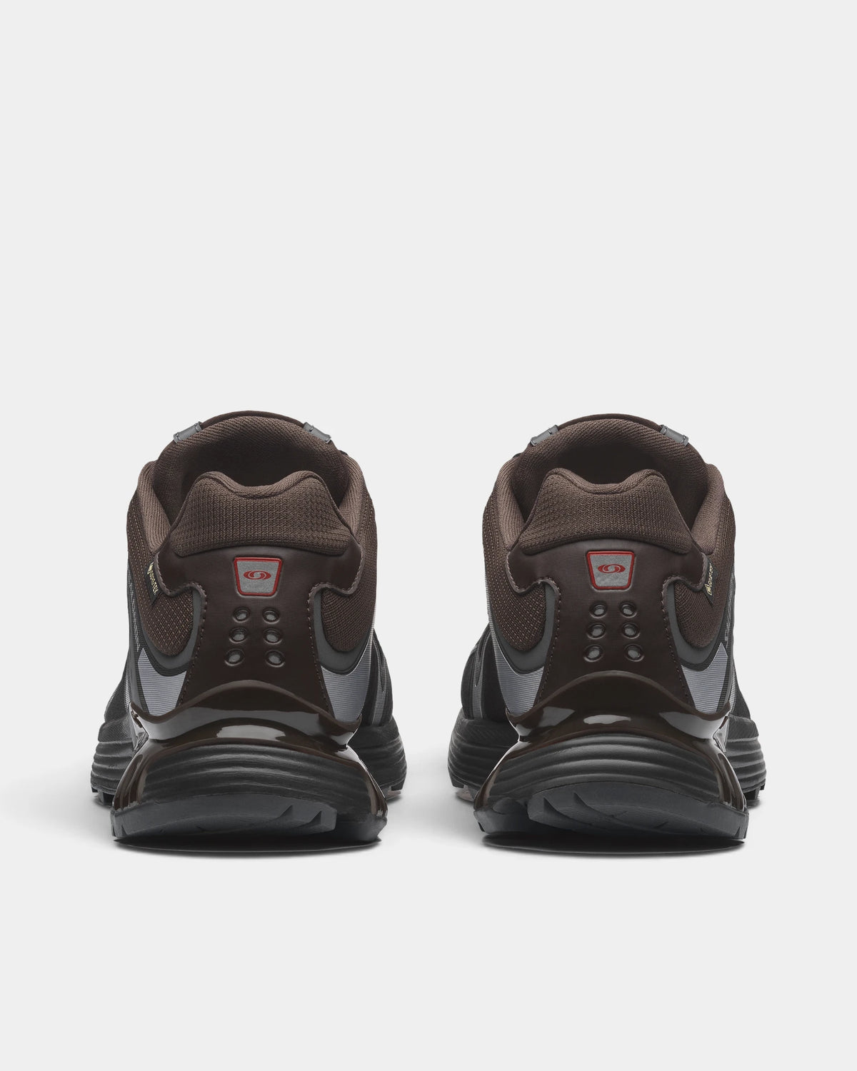 Salomon XT-Whisper Gore-Tex Shoes in Delicioso/Asphalt/Castlerock, both shoes from behind, showing the dark brown and grey Gore-Tex upper on a black sole