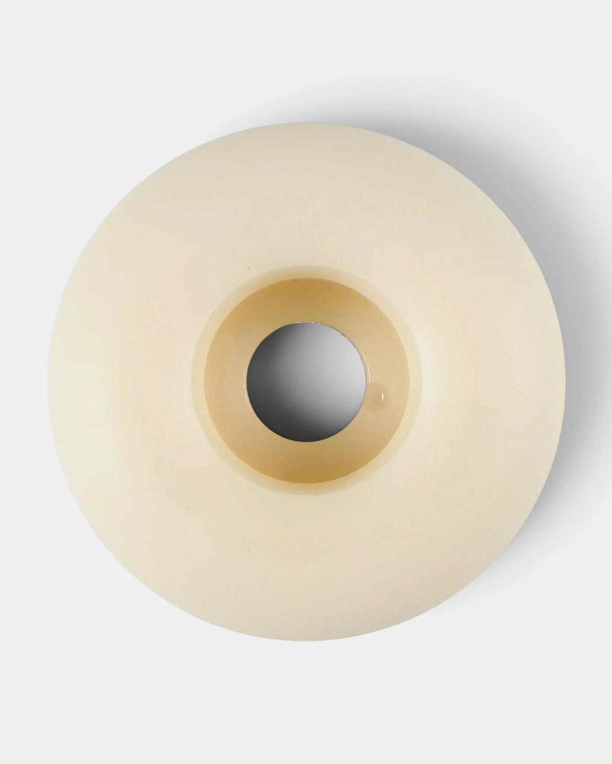 Back of a plain natural urethane Spitfire wheel showing the bearing seat and core