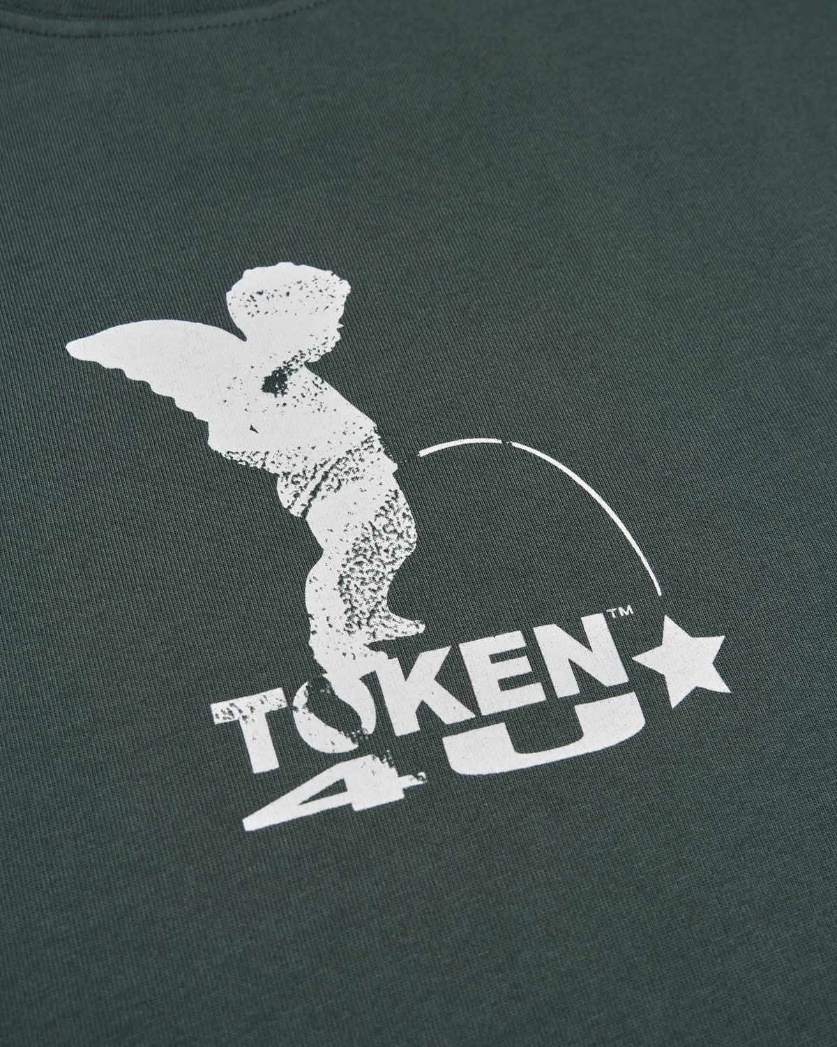 Lockwood Avenue Token Angelic t-shirt in midnight green with a pale winged cherub print, close up of the print, a winged cherub above the TOKEN 4U lettering